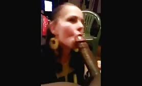 Freaky White girl sucking a fully erect BBC