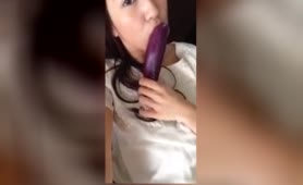 Asian woman Records Herself Wanking with Dildo