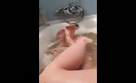 two girls taking a bath together