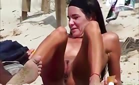 Naked girls on the beach with fit bodies