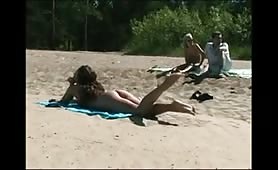 Hot young beach nude posing