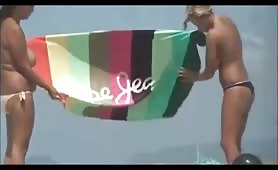 huge melons lesbian teasing on beach